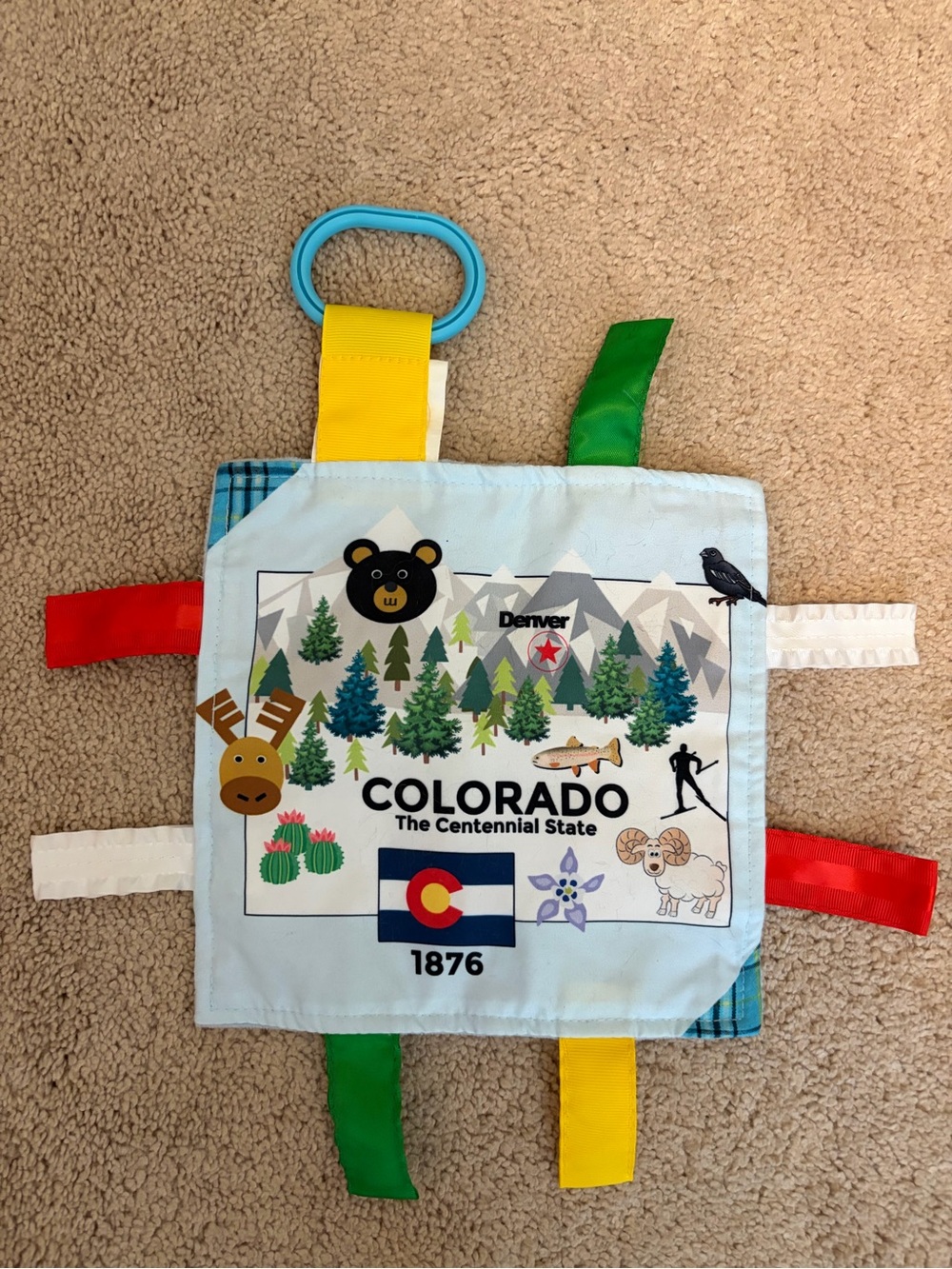 Colorado Themed Sensory Crinkle anTag Toy - Light Blue with Colorful Ribbon Tabs
